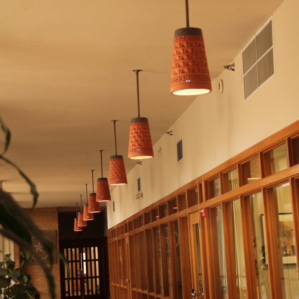 Pendants running along the east-west corridor.
